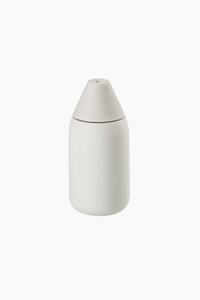 ZONE Denmark Singles Soap Dispenser - Grey
Small designs can sometimes make a big impression. What a stylish way to dispense just the right amount of soap! The rocket-shaped body of the Singles dispenser has a futuristic elegance. With its broad, cylindrical base, the dispenser sits firmly on the countertop. Gentle pressure dispenses just the right amount of soap from the hole in the top. To refill, simply unscrew the top. The dispenser is made of silky soft silicone that is pleasant to the touch and easy t