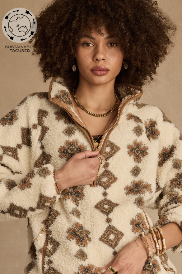 Harlow Fleece Pullover - Abstract, by The Upside

Cosy up in this seasons printed Harlow Pullover.

Relaxed pullover style with raglan sleeves
Printed in tan abstract print
Recycled warm fleece fabrication
Contrast woven binds in khaki
Quarter zip through with zip pockets
Elastic at waist and cuffs to keep warmth in
Embroidered arrow logo at centre back
Please refer to studio images for accurate colour of garment