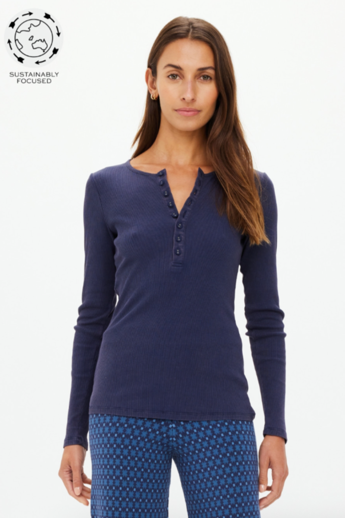 Ness Ribbed Long Sleeve Top - Washed Denim, by The Upside

A sweet staple piece for any wardrobe.

Slim fit long sleeve organic cotton rib in navy
Fabric covered buttons at front neck
Branded pip on sleeve cuff
The perfect piece for layering and styling up or down
Please refer to studio images for accurate colour of garment