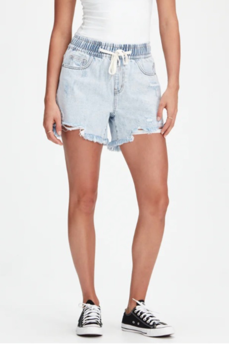 Stella Shorts - Light Blue, by Junkfood

The popular Stella is back! In a slightly LONGER LENGTH for summer '25/'26

High waisted ripped denim shorts with elastic waist and shoe string tie.


In a premium quality rigid denim with frayed hem in pale blue. If you already have Stella, you'll need a pair of these.&nbsp;

With ripped front panels and a raw&nbsp;hem. Can be worn higher or lower on the waist as preferred.&nbsp;Stella Pale Blue looks great worn fitted or over sized.

Fixed waist band with belt loop