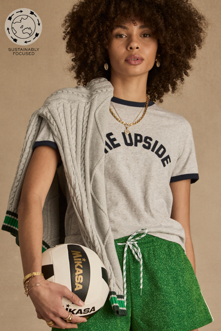 Jarama Joy Tee - Grey Marle, by The Upside

Embody retro charm in this classic tee

Retro inspired tee in grey marle organic cotton jersey
Contrast navy binds at neck and sleeve
THE UPSIDE applique logo in navy at front chest
Please refer to studio images for accurate colour of garment