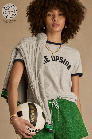 Jarama Joy Tee - Grey Marle, by The Upside

Embody retro charm in this classic tee

Retro inspired tee in grey marle organic cotton jersey
Contrast navy binds at neck and sleeve
THE UPSIDE applique logo in navy at front chest
Please refer to studio images for accurate colour of garment