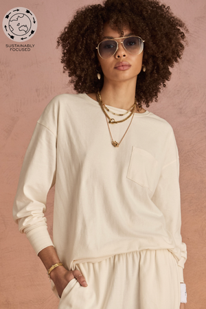 Soho Cara Long Sleeve Top - Creme, by The Upside

An effortless staple, cut for comfort and style

Long sleeve top in soft brushed recycled cotton
Relaxed silhouette shape in washed cream
Ribbed neck and cuffs
Patch pocket at front
Embroidered arrow logo at back
Please refer to studio images for accurate colour of garment