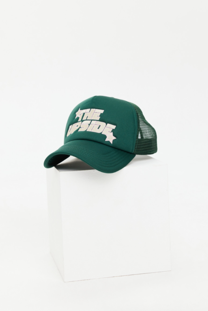 Stardust Trucker Hat - Racing Green, by The Upside

A retro-inspired cap with structured shape and breathable mesh perfect for sun-soaked days

Classic trucker in racing green foam front and mesh back
Adjustable snapper at back
Embroidered THE UPSIDE star logo at centre front in cream and pink
Please refer to studio images for accurate colour of garment