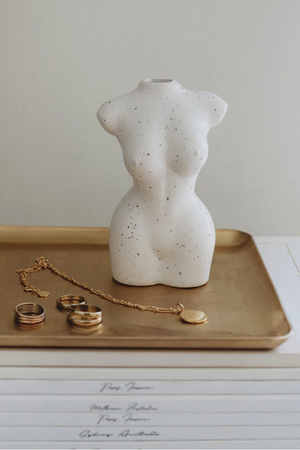Figure Vase, by PapierHQ

Our ceramic figure vase celebrates all women. A beautiful piece to use as a decorative item in your home or the perfect size for dried flowers. It's minimalistic design oozes style. A beautiful sculpture created from ceramic and hand sprayed creating a one of a kind piece with flecking detail that is unique to you. The perfect addition to your home.&nbsp;

Dimensions: 8cm x 6cm x 12.5cm