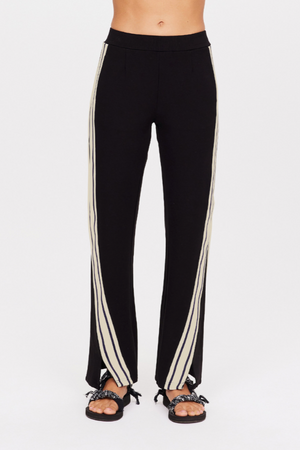 The Origional Petra Flare - Black/Natural, by The Upside

For a directional take on athleisure, discover the Petra Flare.

A fresh look to our original, best-selling black Petra Flare
Flared pant with splits at front.
Contrast knitted tape down side seams adding a sporty touch.
Tonal embroidered arrow at back.
Elasticated waist.
Side seam pockets
Soft suiting Ponti fabrication
Please refer to studio images for accurate colour of garment