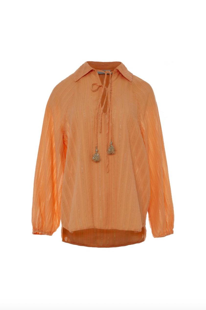 Magic Blouse - Dark Orange, by Devotion Twins

NOTE: Blouse does not have collar&nbsp;

lightweight cotton blouse
gold lurex thread detail and neck tie tassel
elasticated arm cuff
side split
hi lo hem
V-neck or high neck when tied