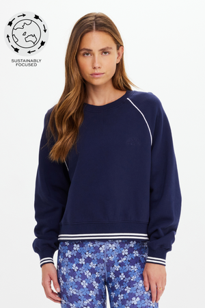 Astra Paloma Crew - Navy, by The Upside

The Astra Paloma Crew pairs everyday ease with classic hues

An oversized crew in navy
100% brushed organic cotton loopback fabrication
The Upside embroidered logo at front chest
Ribbed neckline
Ribbed cuffs and hem with white stripe accent
Drop shoulder relaxed styling with white piping detail