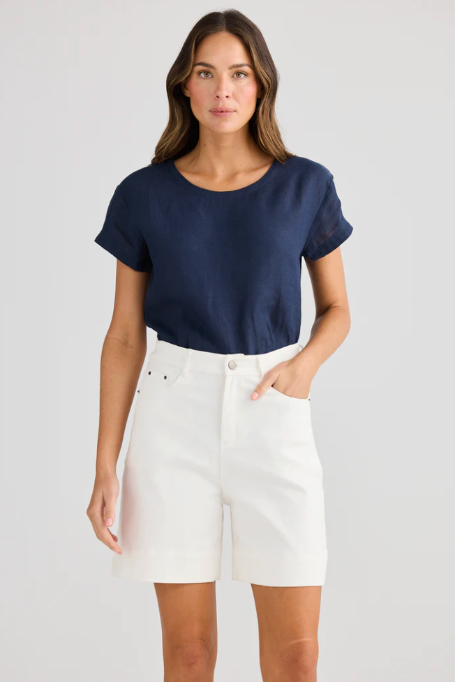 Vacation Short - White, by Holiday
Sits on natural waist

Standard zip fly

Classic 5 pocket design

Mid-thigh cut

Comfort stretch denim fabrication