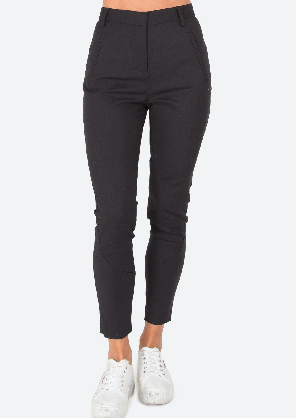 Nest Pants - Black, by Ridley  A super comfortable slight stretch pant that can be dressed up or down.  We love the streamlined features and 7/8th length for the perfect fit and maximum versatility.  Features:  7/8th leg length  Side zips at ankle for a slimline fit  Stretch for comfort and shape  Side pockets with zips for a streamlined look  Hook and bar closure at waist