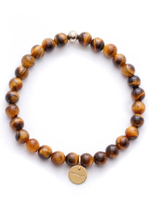 Mens Amuleto Tiger's Eye Bracelet, Gold Filled, by VANIA Said to be the stone that heals issues of self-worth, self-criticism and blocked creativity, by wearing this piece be reminded of your abilities and talents. Sometimes it’s easy to focus on what we need to fix, in that let’s not forget to pause and celebrate. Let’s not forget why we do what we do. This Tiger's Eye Bracelet is your constant reminder to do what you love and love what you do.