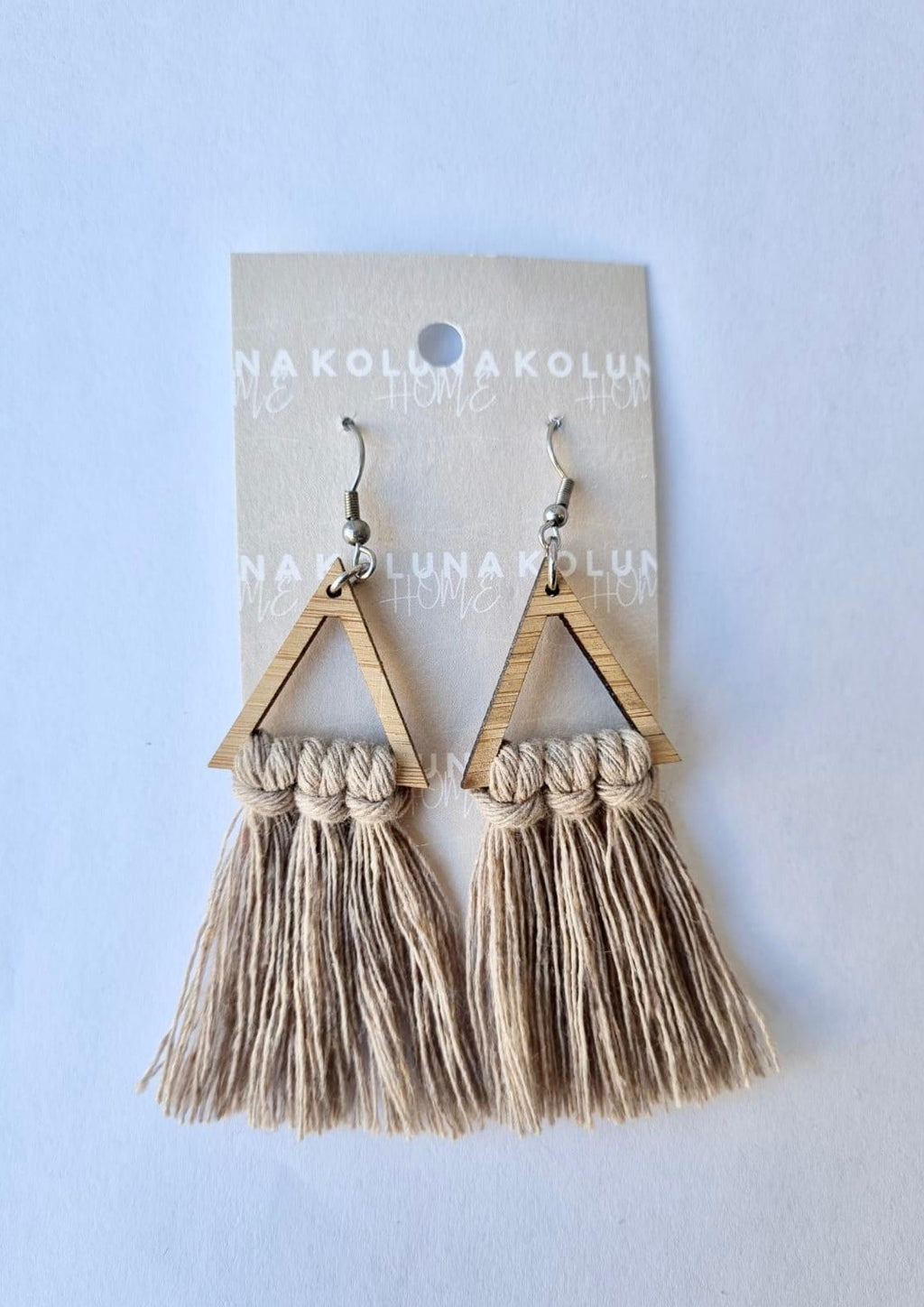 Triangle Bamboo Earrings - Natural The Earrings that go with everything! And look gorgeous with our matching Macrame clutch/cross body bags. Details and materials: Triangle shape lightweight bamboo frame Rope is 100% Recycled Cotton Hooks are surgical steel Handmade in NZ