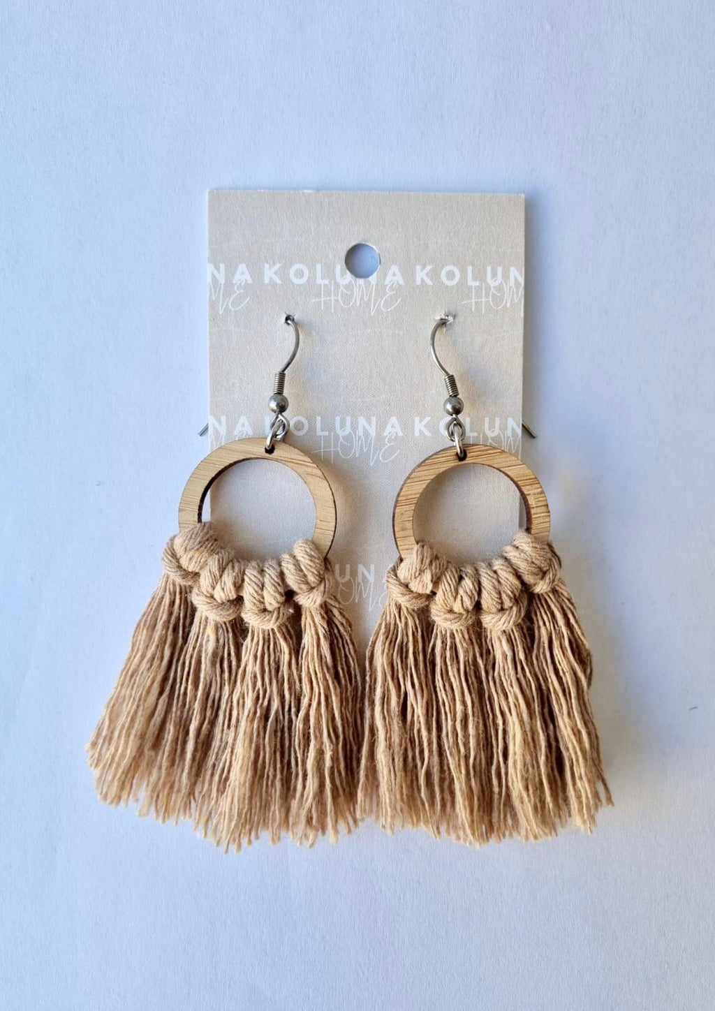 Circle Bamboo Earrings - Light Brown  The Earrings that go with everything! And look gorgeous with our matching Macrame clutch/cross body bags.  Details and materials:  Circle shape lightweight bamboo frame  Rope is 100% Recycled Cotton Hooks are surgical steel  Handmade in NZ