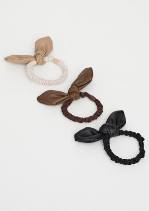 P.U Bunny Hair Ties - Set of 3, by Stella + Gemma Have a little fun with your work or workout look, with these cute but on-trend P.U hair ties.  3 hair ties per pack - latte, coffee, black