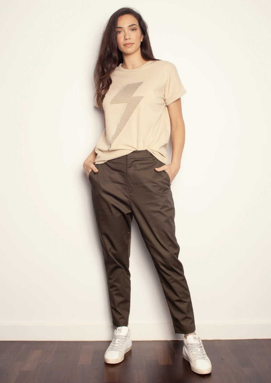 The Relaxed Pant - Dark Olive, by The Others  This relaxed pant in a Dark Olive colour has a soft hand feel made from cotton blend woven fabric.  The pant comes in a regular fit, with tapered leg, fixed zip fly front with elastic back waistband and side seam pockets.  Style with your fave neutral tee, or our gorgeous Slouchy Sweat with Zebra Lips to glam them up a little