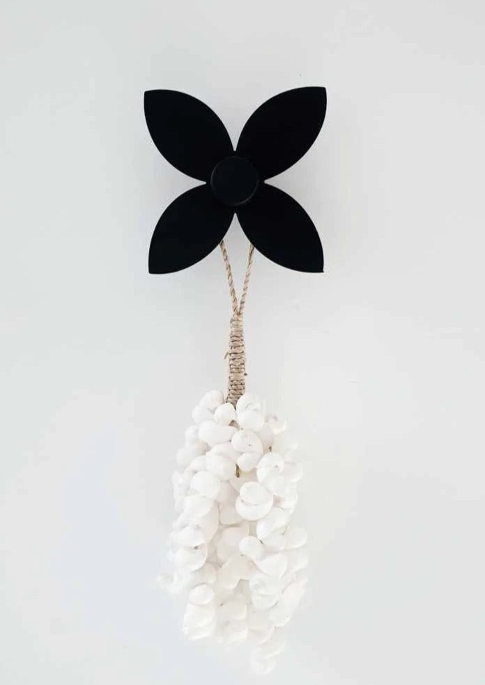 Frangipani Wall Hook - Set Of Three   Lisa's new frangipani wall hooks make a stunning addition to your wall - indoors or outdoors.   25mm projection from wall available as a set of 3, each measures 11cm diameter (front) Hooks are made from high quality stainless steel, coated with a dulux uv resistant coating in matte black or matte white. 