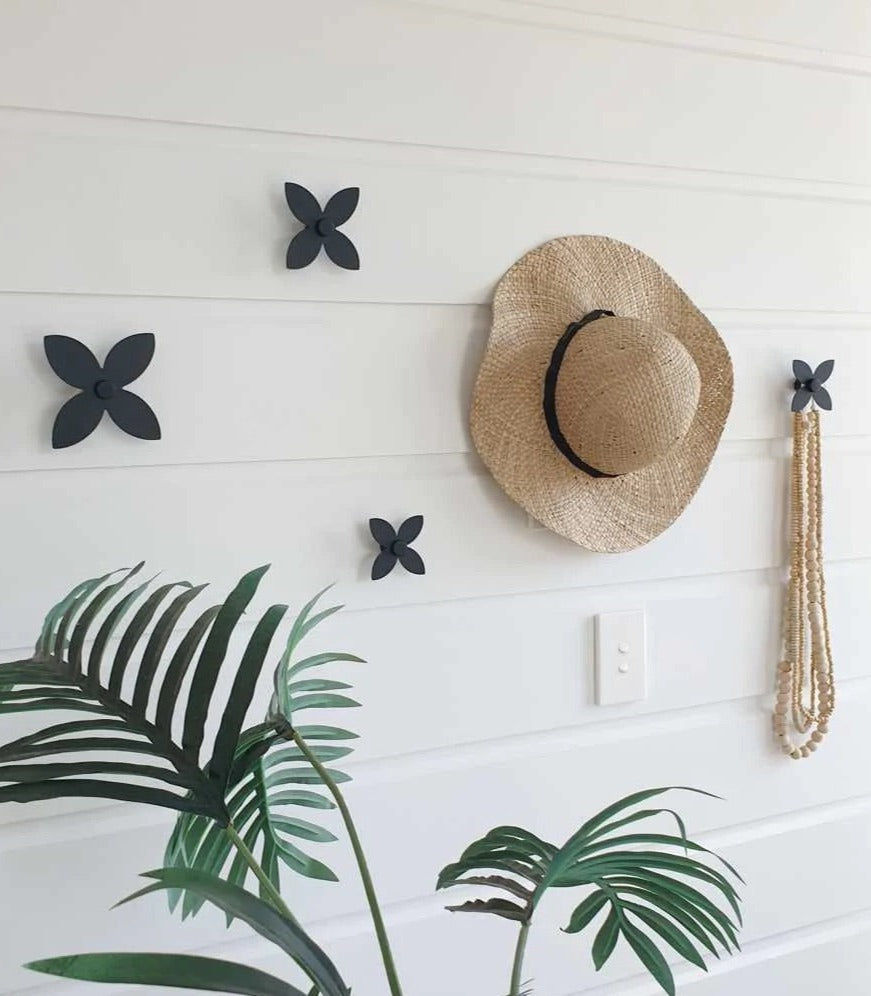 Frangipani Wall Hooks - Set Of Five (black or white), by Lisa Sarah