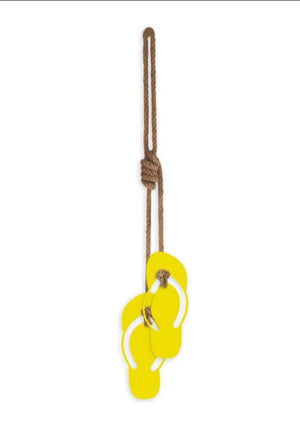 Hanging Jandals - Yellow, by Lisa Sarah  The iconic NZ jandal wall hanging, now in sunny yellow comes tied as shown and measures 1.2m long.  Jandals are 300mm long. 