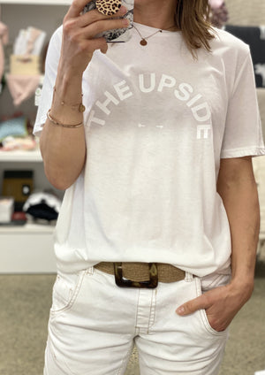For a staple that will see you through all seasons, The Upside Tee simply can't be beat.  - Loose fit tee in crisp White.  - Tonal horseshoe logo at centre chest.  - Made of pure single jersey organic cotton - a sustainable fabric that you can feel good about (and in!).