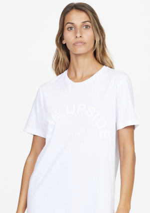 The Upside Tee - White  For a staple that will see you through all seasons, The Upside Tee simply can't be beat.  - Loose fit tee in crisp White.  - Tonal horseshoe logo at centre chest.  - Made of pure single jersey organic cotton - a sustainable fabric that you can feel good about (and in!).