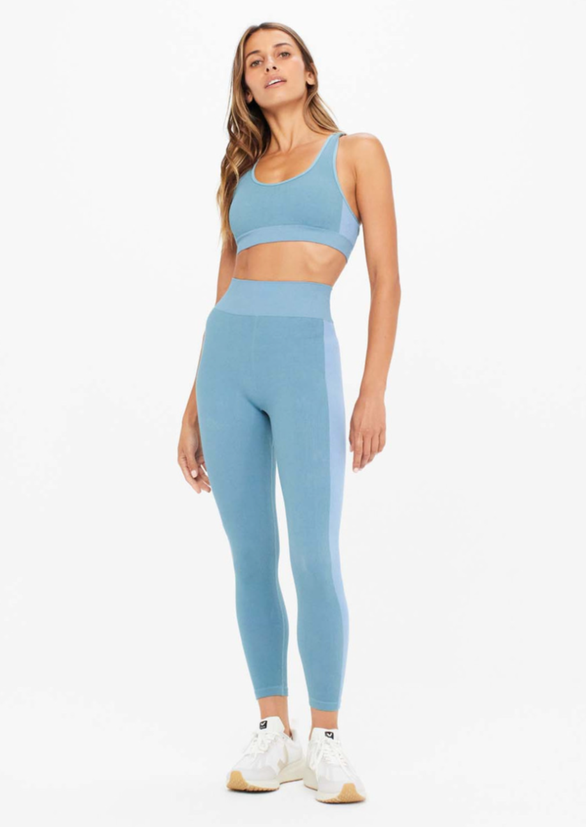Soft Seamless Midi Pant - Reef, by The Upside Take the easy way out in our Seamless Knit Midi Pant.  Super soft two tone rib seamless knitted fabrication Knitted contrast arrow logo at centre back Mid-rise 7/8 length leg Perfect for a yoga class and anything in-between Contrast knitted panels Moisture control properties 