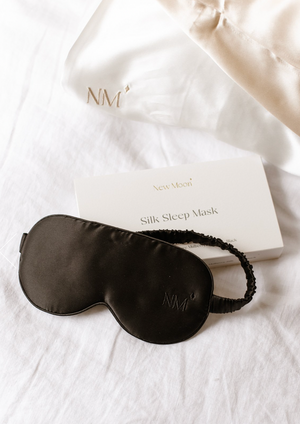 Silk Eye Mask - Black, by New Moon Silk  Description: One size fits all sleep mask. Black colour way. Made from 100% pure Mulberry Silk, 19 momme. Hypoallergenic.