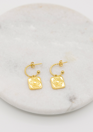 Sacred Earrings in Gold | Love Lunamei  From our Lotus Collection - The Sacral Chakra   When our Sacral Chakra is balanced it allows us to be passionate and creative, while connecting us with our true feelings and emotions. Our Lotus collection is delicately etched with lotus flower petals and a hidden crescent moon to remind us of our connection to both Mother Nature and the Lunar Phases