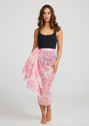 Sierra Sarong/Scarf - Hot Pink + Pink Sorbet Fleur De Lis, by Holiday Offered in a colourful array of eclectic prints, complete your holiday look with the Sierra Sarong. Tie it at the waist for pool-side lounging or change things up and wear it as a scarf! Versatility is key making this one an essential accessory for your next summer getaway!