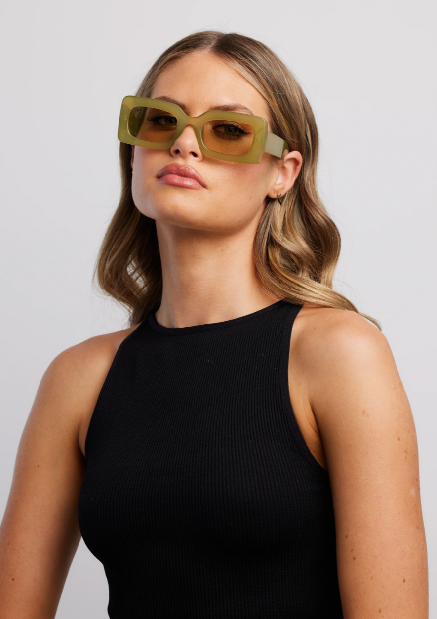 Twiggy Eco - Milky Sage, by Reality Dig it baby - strut down Carnaby St with this reinterpretation of London 60s chic, complete with super flat lenses to bring it into the now.  Details:  100% RECYCLED Robust Polycarbonate Lens       Category 3 Lens   Sage colour category 2          Good UV Protection