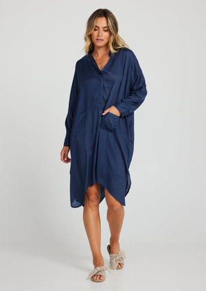Hayman Overshirt - Navy, by Holiday In true Holiday style, the Hayman Overshirt is an easy-wear, throw over piece, perfect for hot summer months.   Details:   • BUTTON UP BODICE • OVERSIZED FIT • FRONT POCKET DETAILS • HIGH LOW HEM 